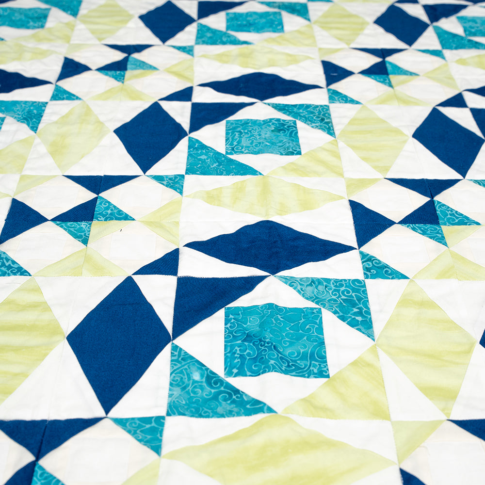 Courtepointe réalisée à l'aide de la technique de piéçage sur papier.