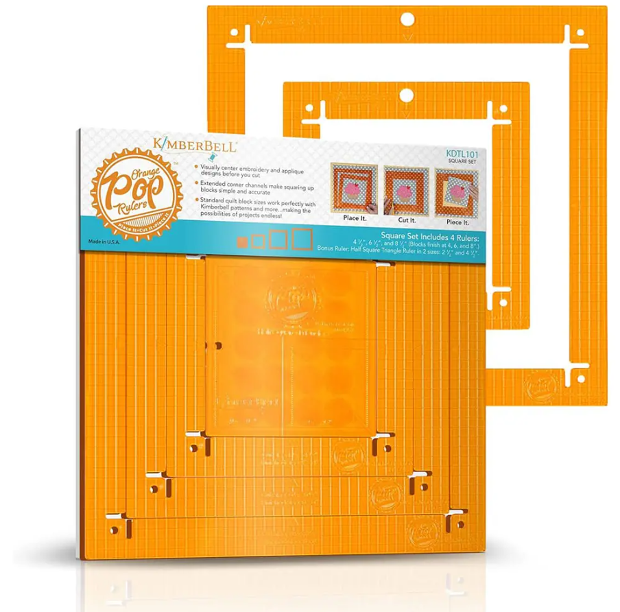 Ensemble de règles Orange Pop de Kimberbell en kit carré, avec emballage visible. Trois cadres en acrylique orange avec un design de coins ouverts sont inclus pour un alignement précis des blocs de quilt.