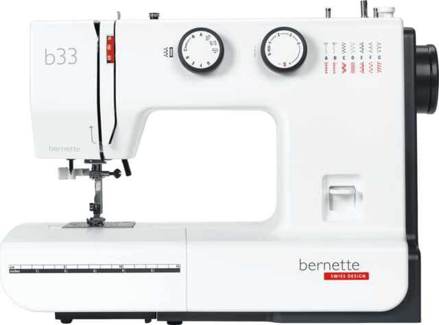 Machine à coudre mécanique bernette 33 – Machine à coudre robuste et simple d’utilisation, au design blanc et noir, idéale pour les débutants et les couturiers amateurs.