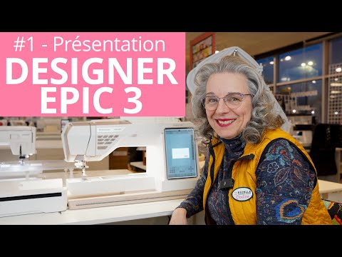 Machine à coudre et à broder Husqvarna Viking DESIGNER EPIC™ 3 – Présentation vidéo avec Clodine. Une femme souriante portant un gilet jaune et un badge "Excelle Clodine" présente la machine à coudre Husqvarna Viking DESIGNER EPIC™ 3 dans une boutique de couture, avec un grand écran tactile visible. Le texte "#1 - Présentation DESIGNER EPIC 3" est affiché en arrière-plan, indiquant le premier épisode d’une série YouTube sur cette machine.